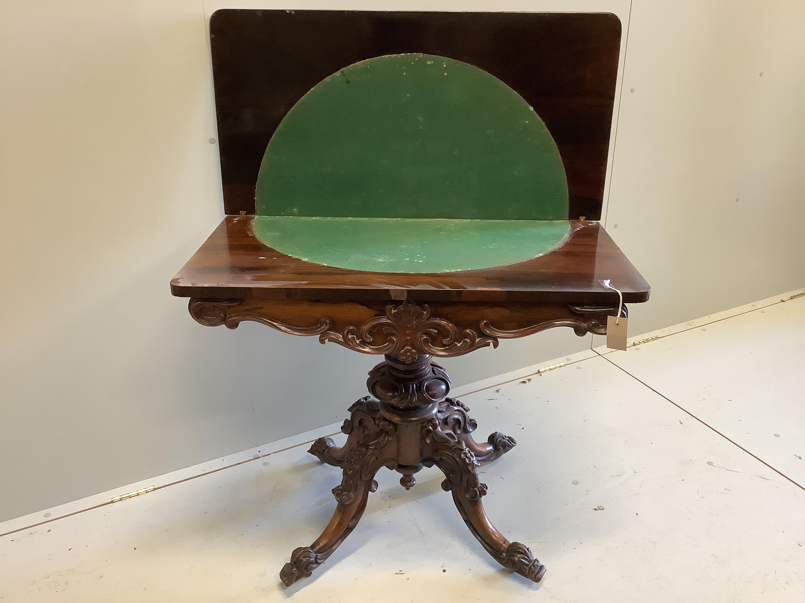 An early Victorian rosewood rectangular folding card table, width 89cm, depth 46cm, height 75cm